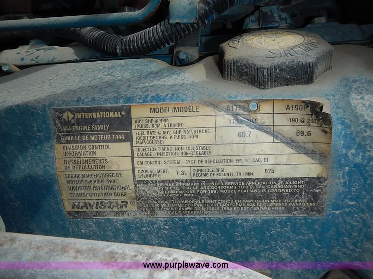 image for item I3549 1995 International 4700 Lo Profile flatbed truck