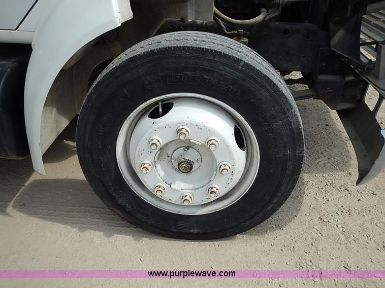 image for item I3549 1995 International 4700 Lo Profile flatbed truck