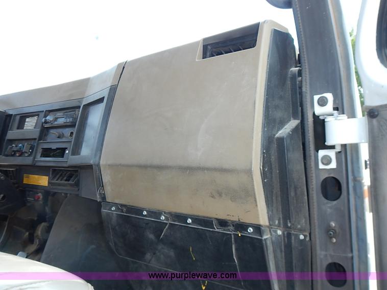 image for item I3549 1995 International 4700 Lo Profile flatbed truck