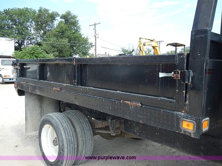 image for item I3549 1995 International 4700 Lo Profile flatbed truck