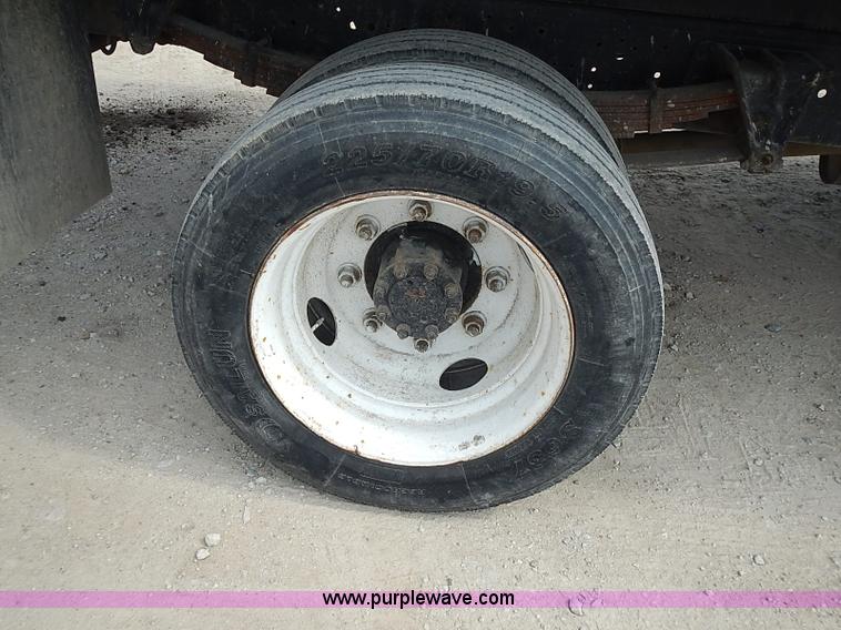 image for item I3549 1995 International 4700 Lo Profile flatbed truck