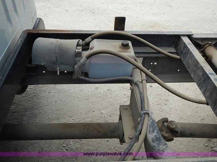 image for item I3549 1995 International 4700 Lo Profile flatbed truck