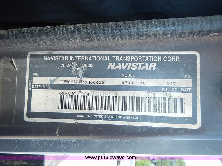 image for item I3549 1995 International 4700 Lo Profile flatbed truck