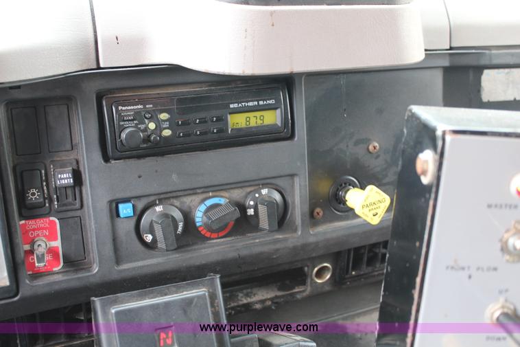 image for item J2160 1999 International 4700 dump truck