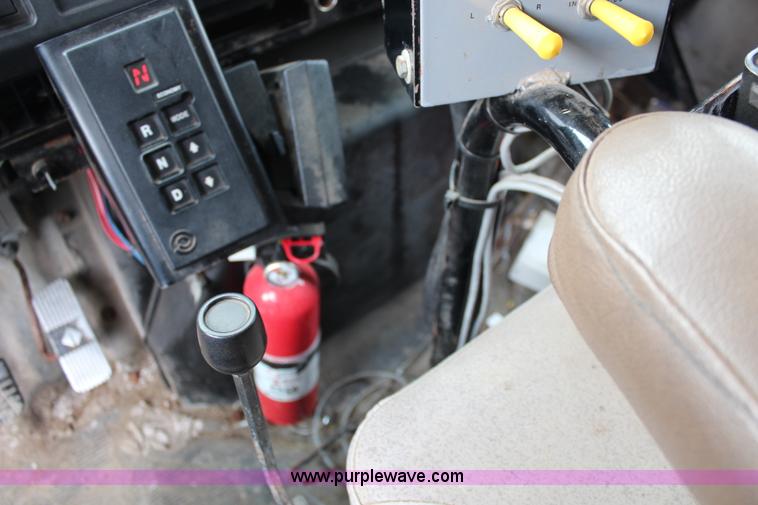 image for item J2160 1999 International 4700 dump truck