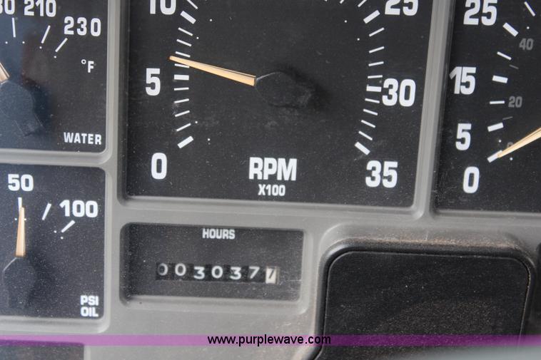 image for item J2160 1999 International 4700 dump truck