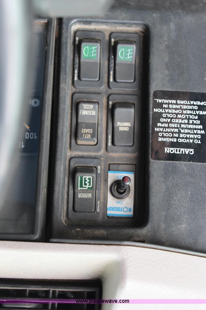 image for item J2160 1999 International 4700 dump truck