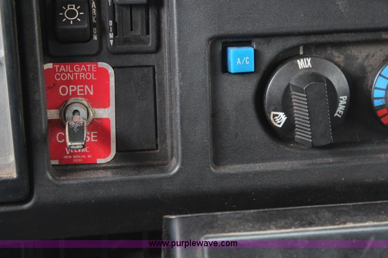 image for item J2160 1999 International 4700 dump truck