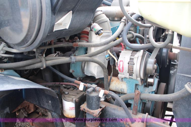 image for item J2160 1999 International 4700 dump truck