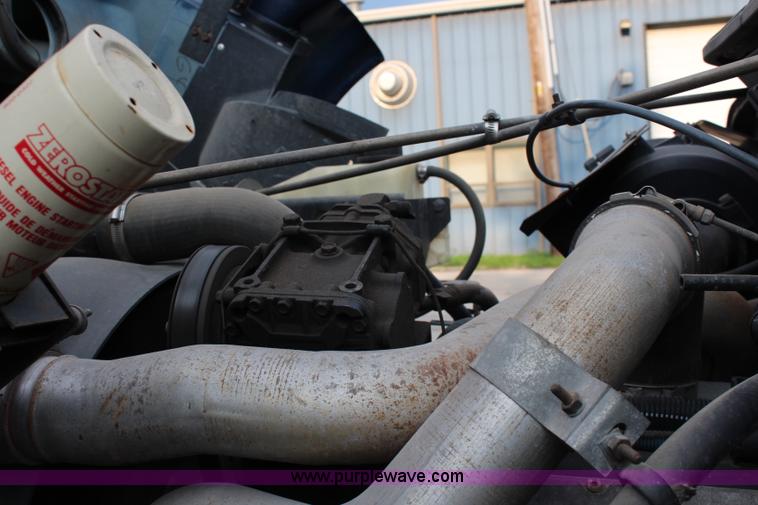 image for item J2160 1999 International 4700 dump truck