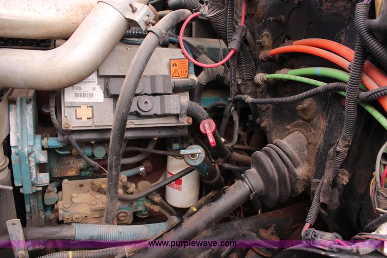 image for item J2160 1999 International 4700 dump truck