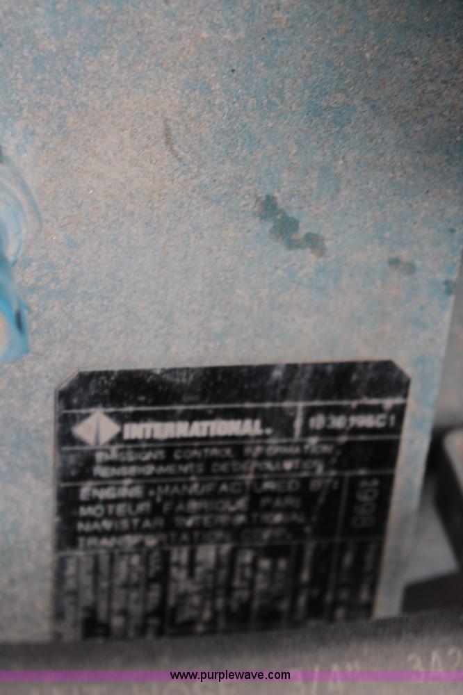 image for item J2160 1999 International 4700 dump truck