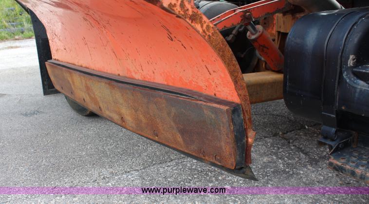 image for item J2160 1999 International 4700 dump truck