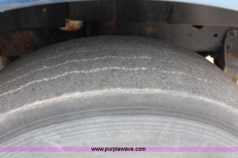 image for item J2160 1999 International 4700 dump truck