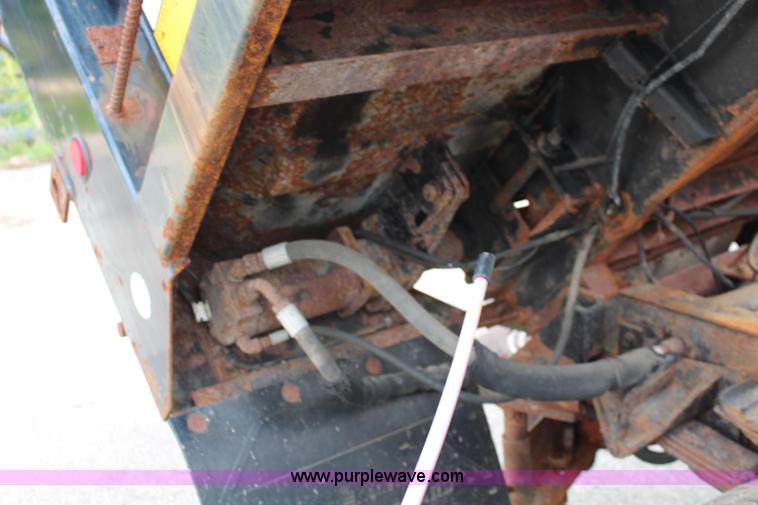 image for item J2160 1999 International 4700 dump truck