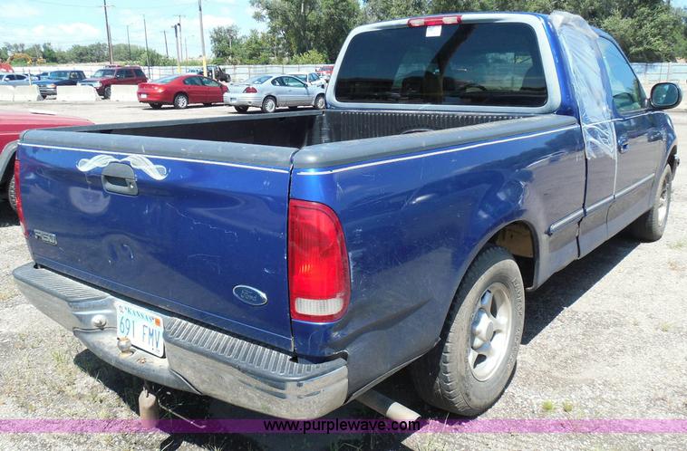 image for item I3371 1998 Ford F150 XLT SuperCab pickup truck