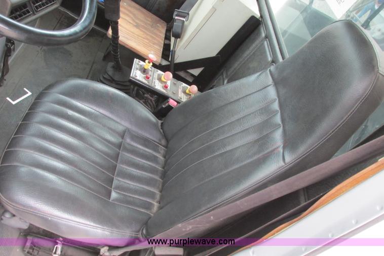 image for item I3482 1998 Mack DM690S liquid vacuum truck with liquid ring blower