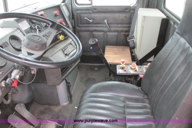 image for item I3482 1998 Mack DM690S liquid vacuum truck with liquid ring blower