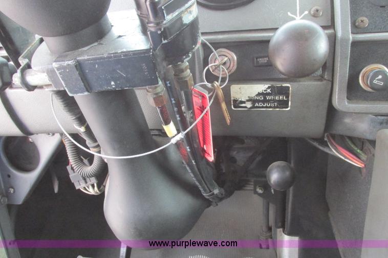 image for item I3482 1998 Mack DM690S liquid vacuum truck with liquid ring blower