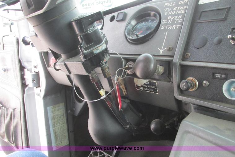 image for item I3482 1998 Mack DM690S liquid vacuum truck with liquid ring blower