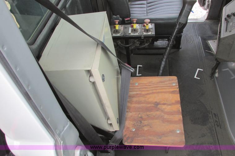 image for item I3482 1998 Mack DM690S liquid vacuum truck with liquid ring blower