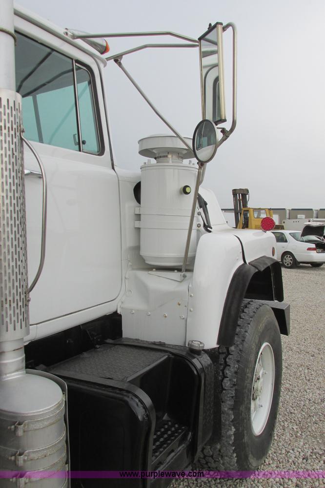 image for item I3482 1998 Mack DM690S liquid vacuum truck with liquid ring blower