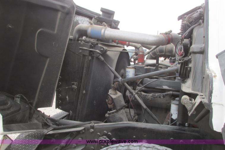 image for item I3482 1998 Mack DM690S liquid vacuum truck with liquid ring blower