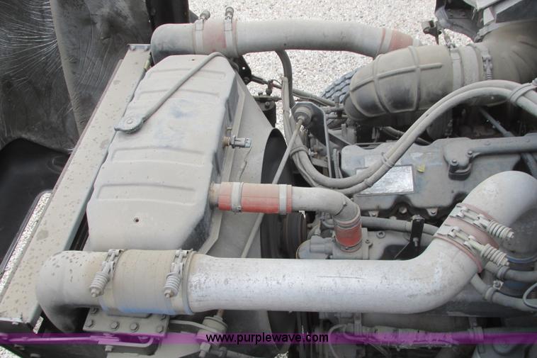 image for item I3482 1998 Mack DM690S liquid vacuum truck with liquid ring blower