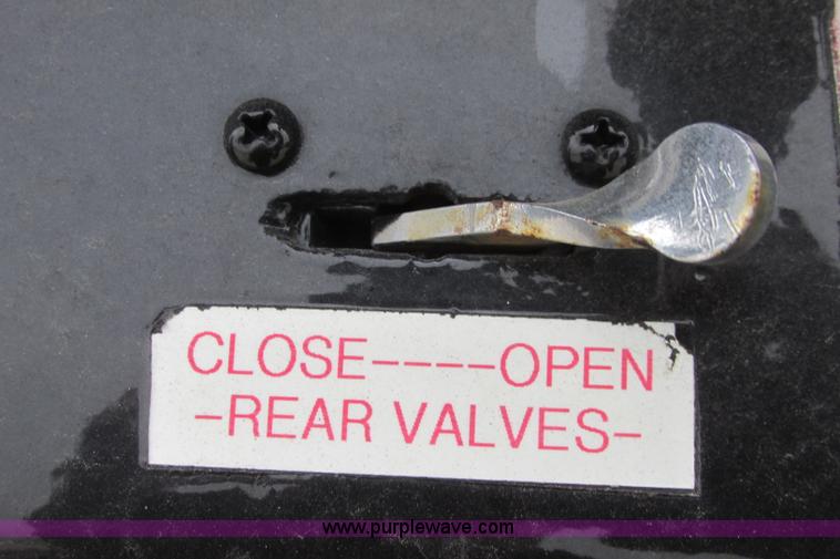 image for item I3482 1998 Mack DM690S liquid vacuum truck with liquid ring blower