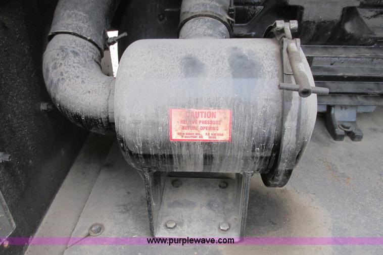 image for item I3482 1998 Mack DM690S liquid vacuum truck with liquid ring blower