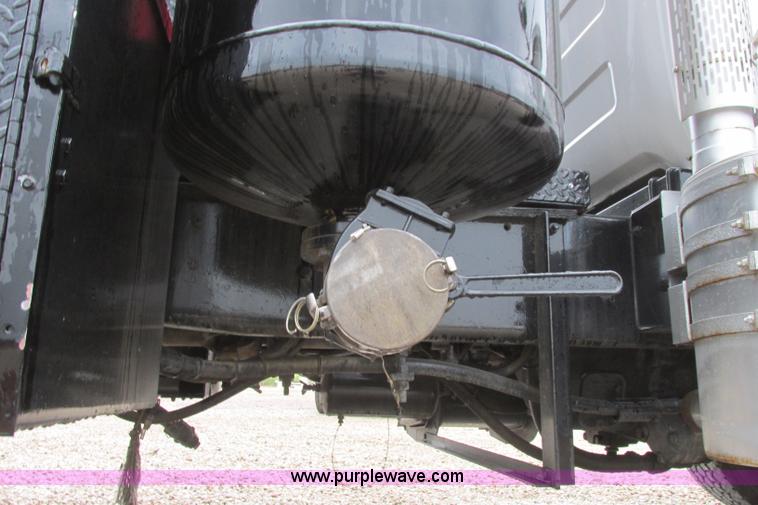 image for item I3482 1998 Mack DM690S liquid vacuum truck with liquid ring blower