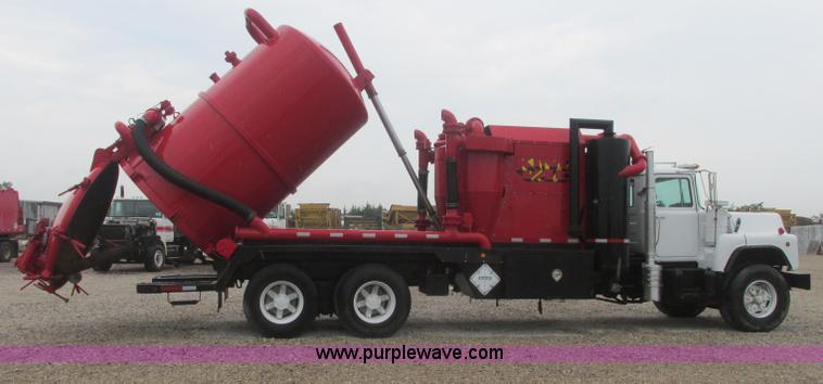 image for item I3482 1998 Mack DM690S liquid vacuum truck with liquid ring blower