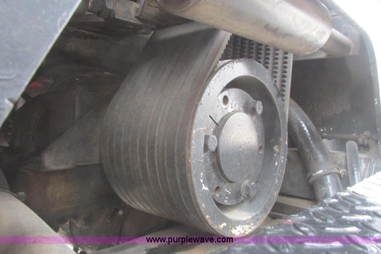 image for item I3482 1998 Mack DM690S liquid vacuum truck with liquid ring blower