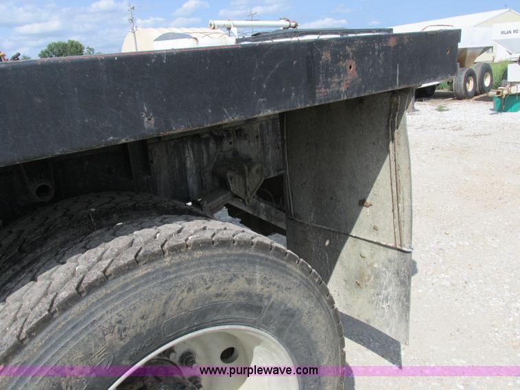 image for item I8962 1998 Volvo WG flatbed truck