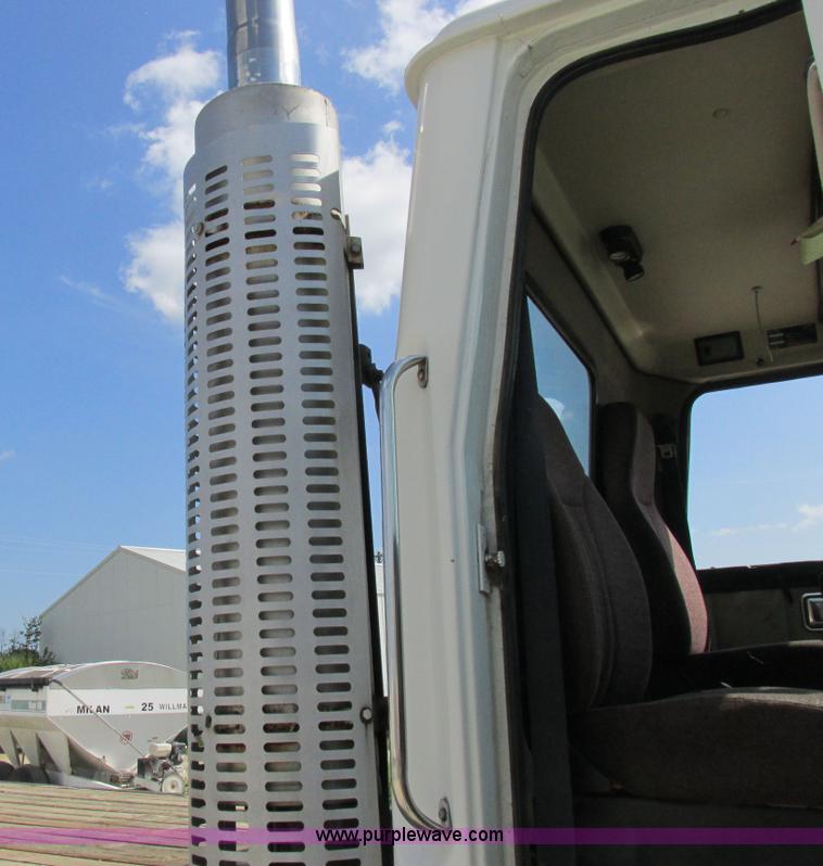 image for item I8962 1998 Volvo WG flatbed truck