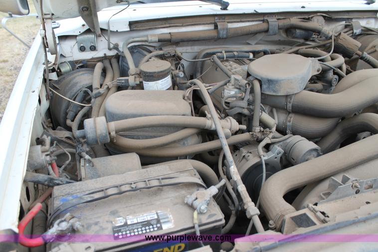 image for item F3340 1990 Ford F250 Lariat utility truck