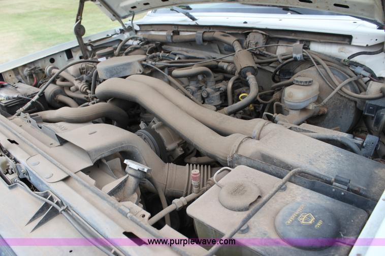 image for item F3340 1990 Ford F250 Lariat utility truck