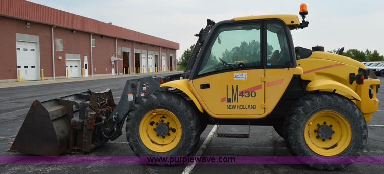 image for item F8334 2002 New Holland LM430 telehandler