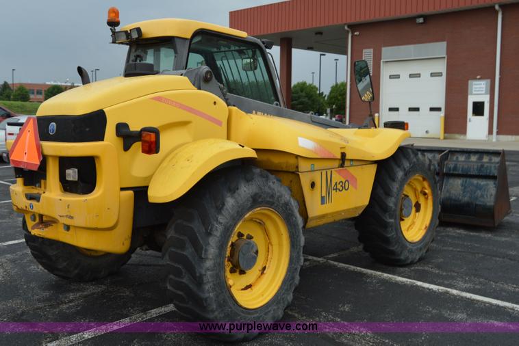 image for item F8334 2002 New Holland LM430 telehandler