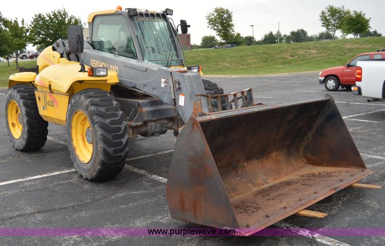 image for item F8334 2002 New Holland LM430 telehandler
