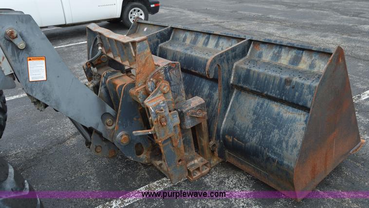 image for item F8334 2002 New Holland LM430 telehandler