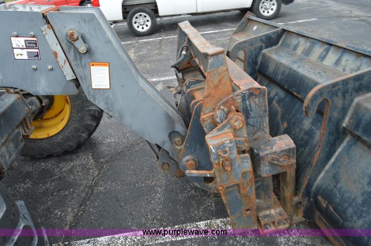 image for item F8334 2002 New Holland LM430 telehandler