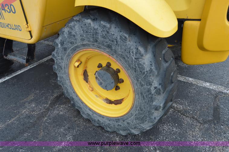 image for item F8334 2002 New Holland LM430 telehandler