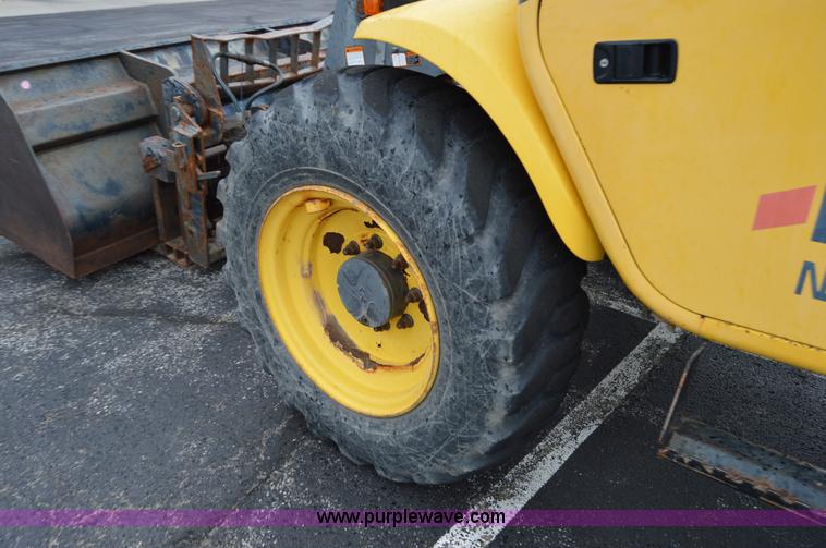 image for item F8334 2002 New Holland LM430 telehandler