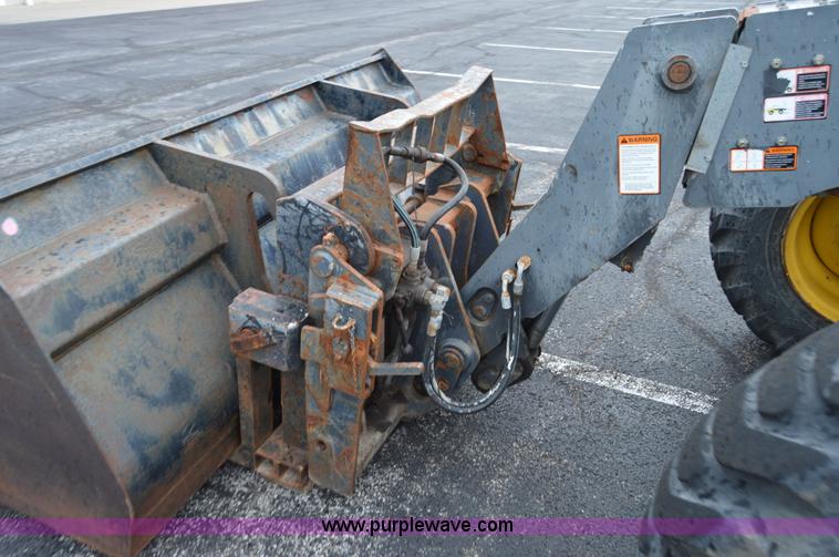 image for item F8334 2002 New Holland LM430 telehandler