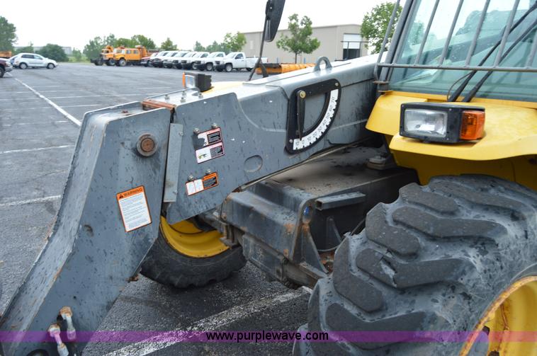 image for item F8334 2002 New Holland LM430 telehandler