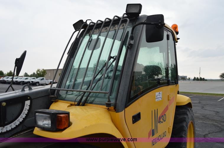 image for item F8334 2002 New Holland LM430 telehandler