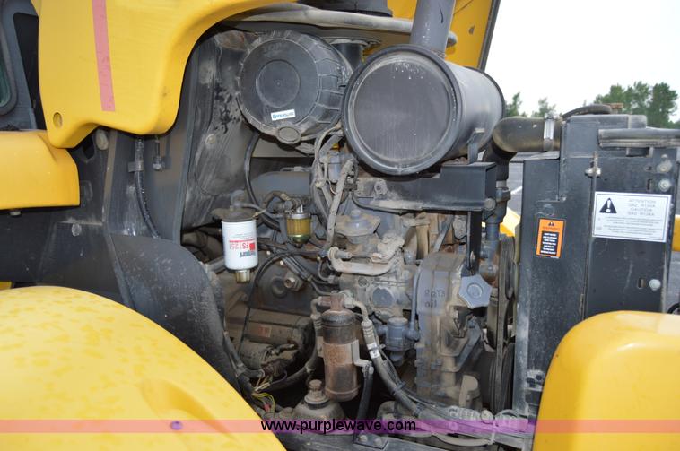 image for item F8334 2002 New Holland LM430 telehandler