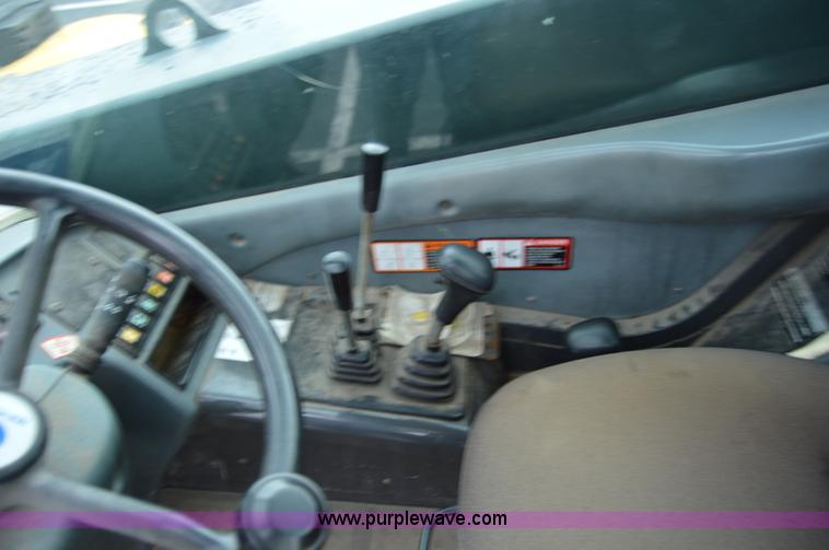 image for item F8334 2002 New Holland LM430 telehandler