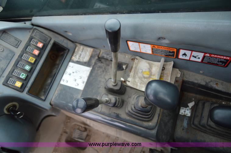 image for item F8334 2002 New Holland LM430 telehandler